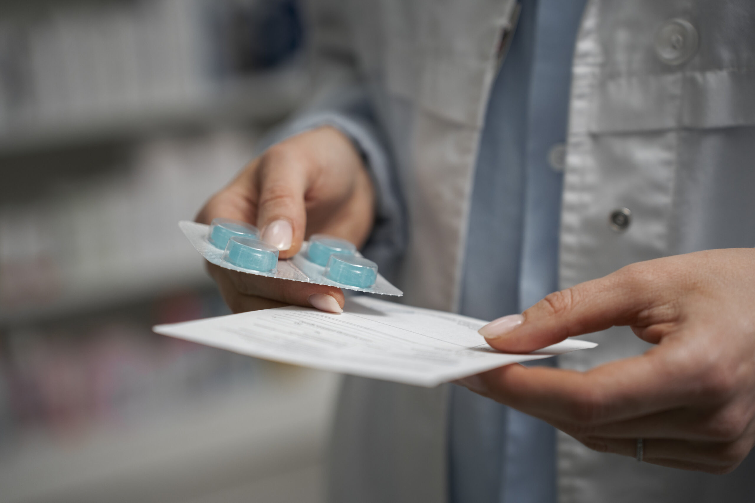 A doctor reviews prescription medication